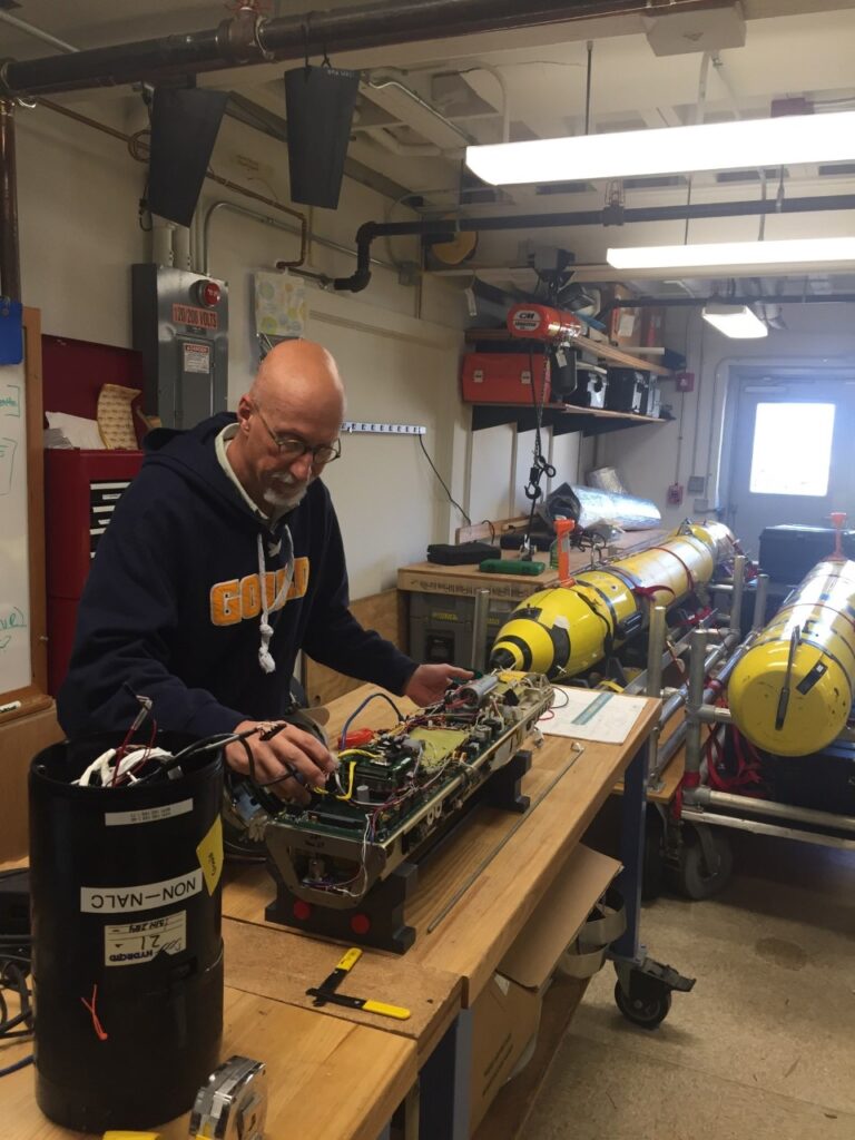 The author updating a REMUS at WHOI